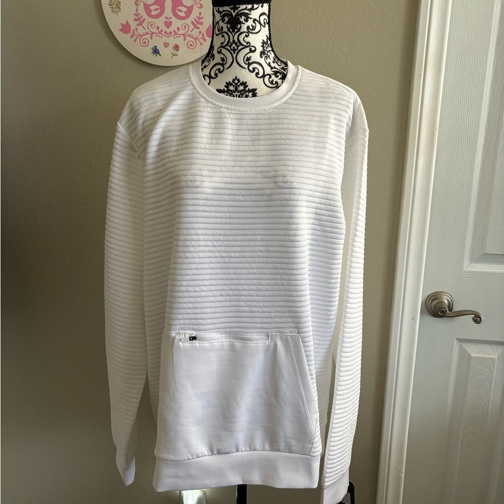 White sweatshirt with front zipper and kangaroo pocket. Very comfortable.